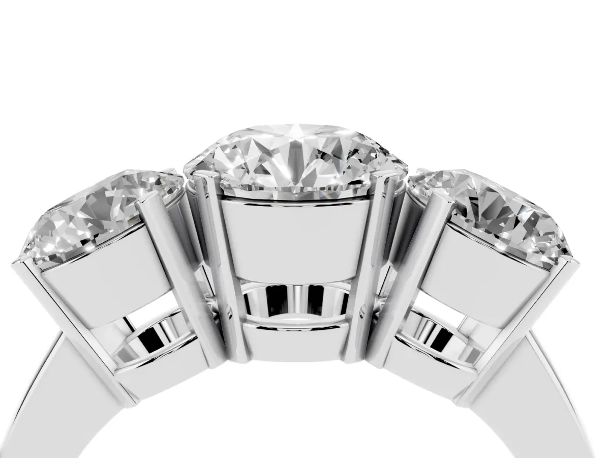 Three-Stone Round Cut Cut Diamond Ring with Channel Set Band and Four-Prong Setting Platinum