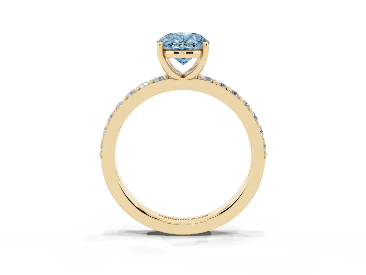 Fancy Blue Oval Cut Cut Diamond Solitaire with Pave Band and Four-Prong Setting Yellow gold