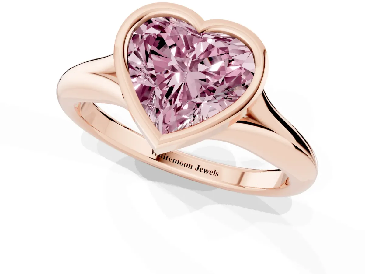 Fancy Pink Bezel Set Heart Cut Solitaire Diamond Ring with Smooth Band Rose gold