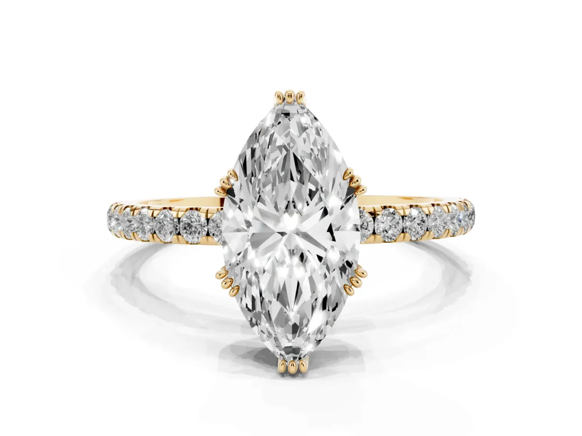 Marquise Cut Brilliant Solitaire with Pavé Band and Claw Prong Setting Yellow gold
