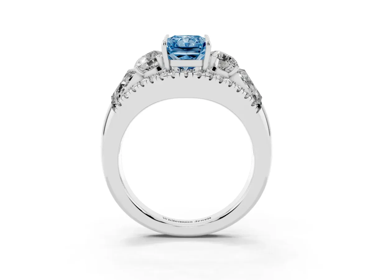 Fancy Blue Three-Stone Radiant Cut Diamond Engagement Ring with Pave Band and Prong Setting Silver