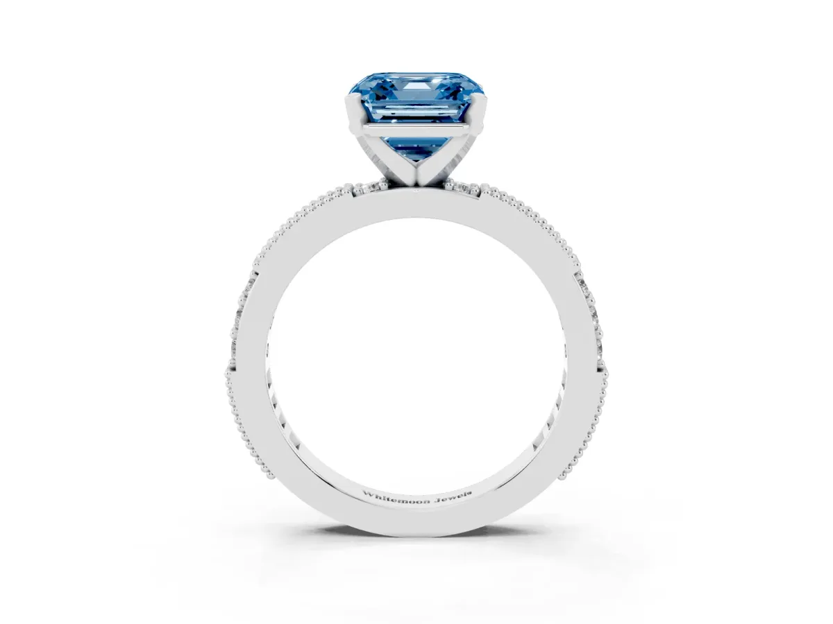 Fancy Blue Asscher Cut Solitaire with Pavé Band and Four-Prong Setting Silver