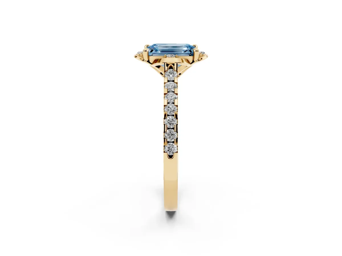 Fancy Blue Emerald Cut Diamond Ring with Pavé Band and Floral Prong Setting Yellow gold