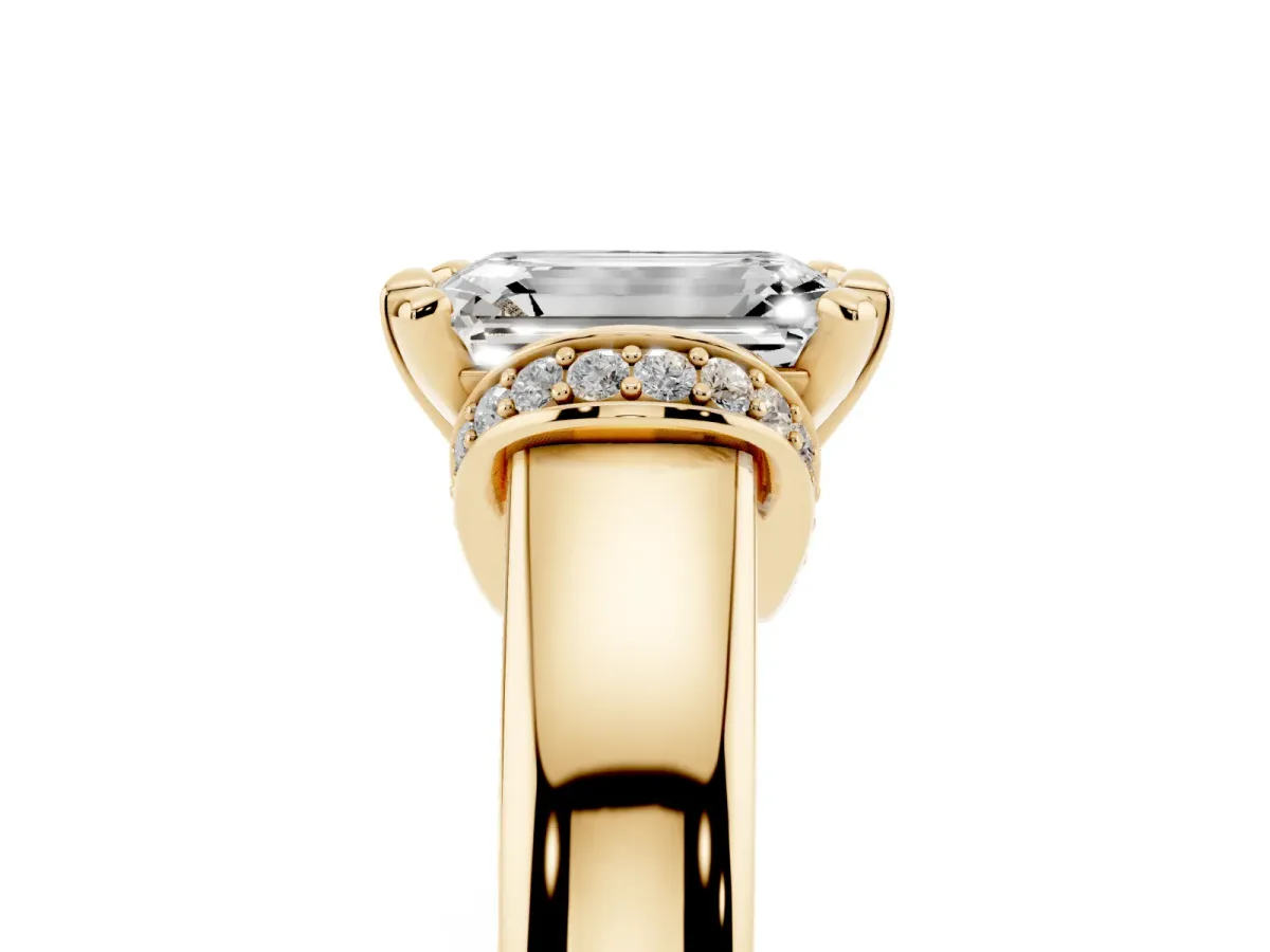 Emerald Cut Solitaire Diamond Ring with Pave Band and Six-Prong Setting Yellow gold