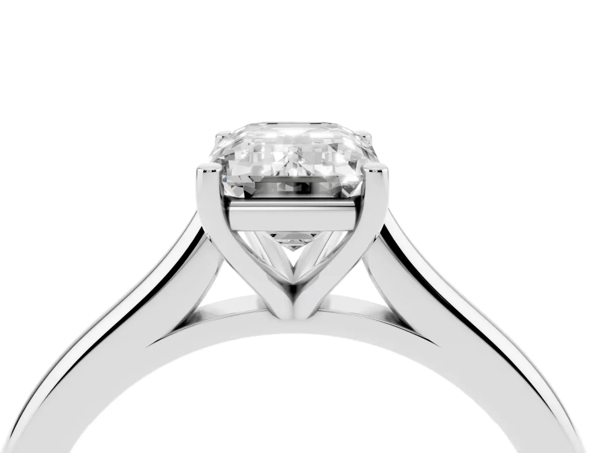 Emerald Cut Cut Solitaire Ring with Cathedral Band and Four-Prong Setting Silver