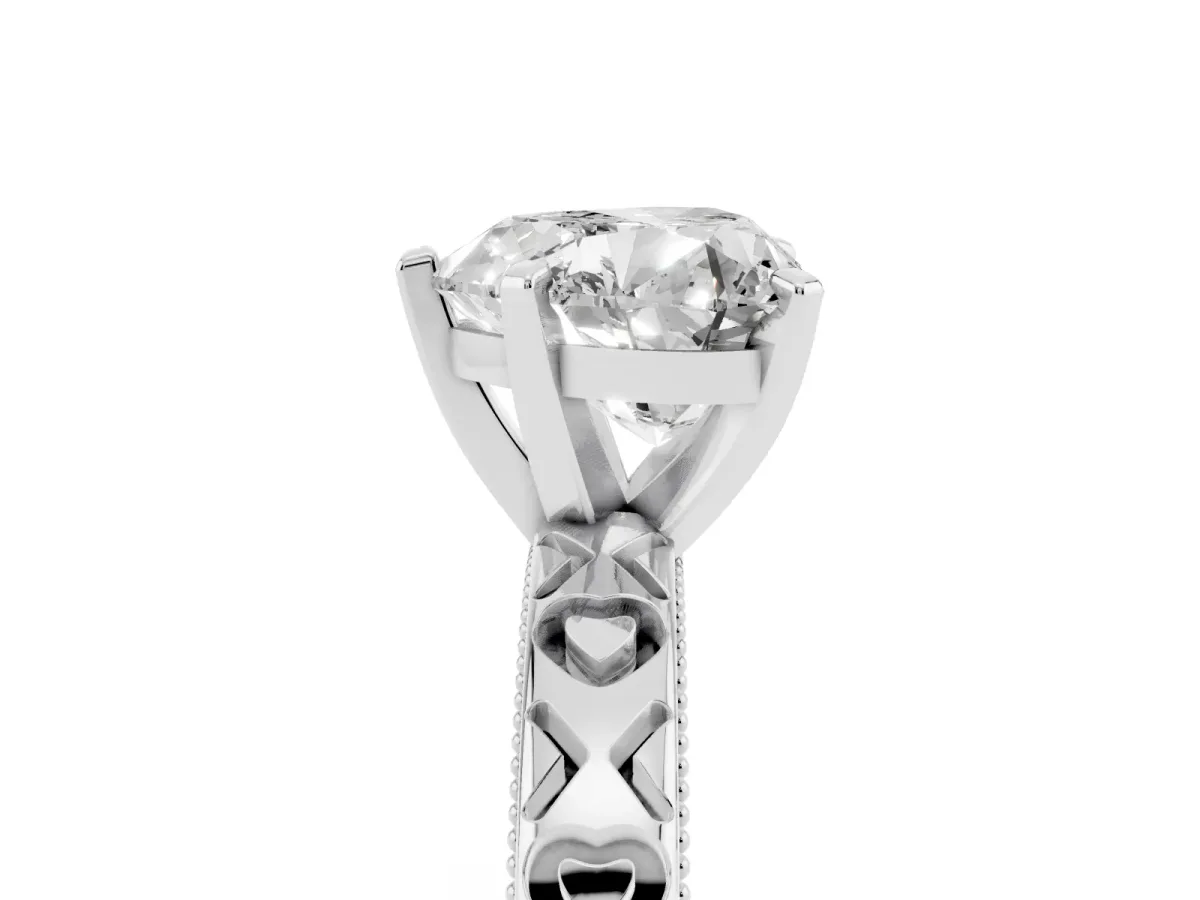 Heart Cut Solitaire Diamond Engagement Ring with XO Engraved Band and Four-Prong Setting Platinum
