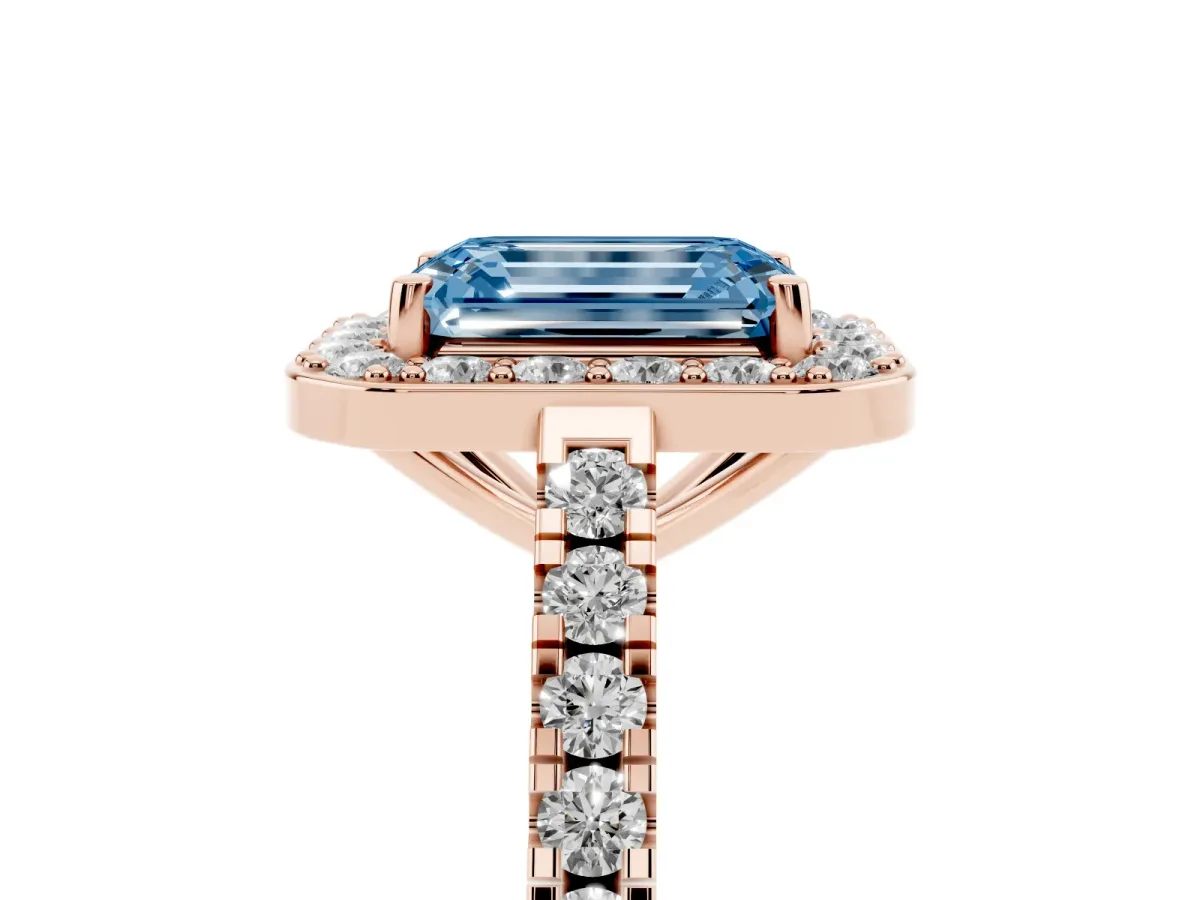 Fancy Blue Emerald Cut Diamond Halo Ring with Round Pavé Split Shank and Prong Setting Rose gold