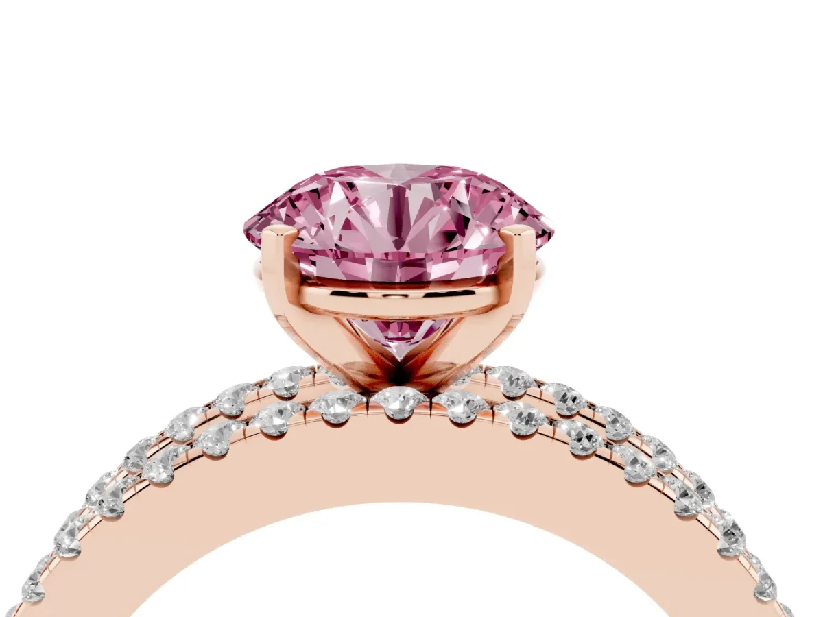 Fancy Pink Round Cut Diamond Solitaire Ring with Pavé and Channel Set Band Rose gold