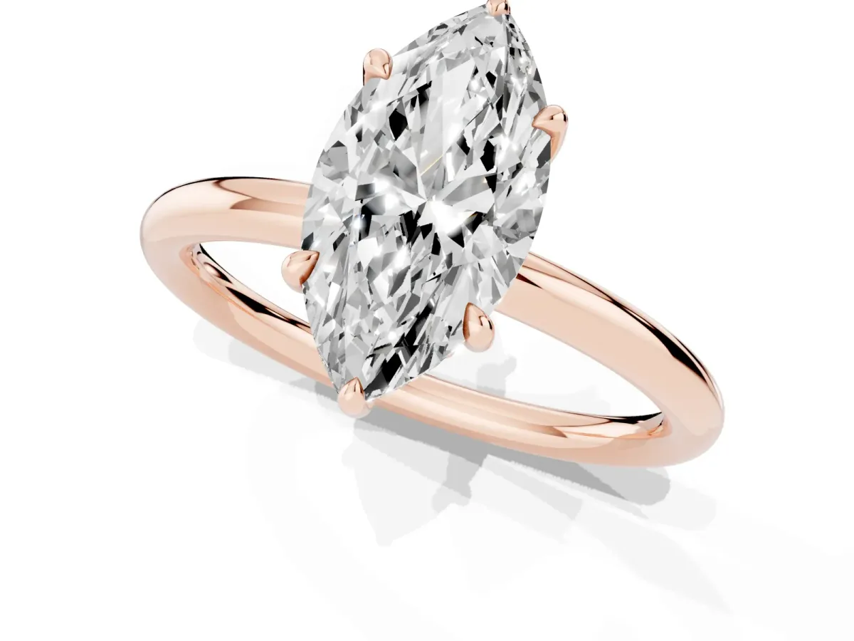 Marquise Cut Diamond Solitaire Ring with Thin Band and Four-Prong Setting Rose gold