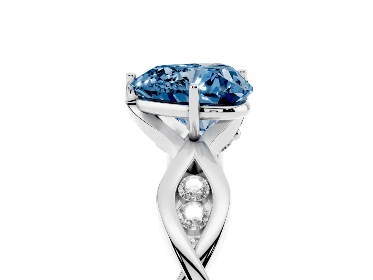 Fancy Blue Heart Cut Solitaire Twist Band with Leaf Prong Setting Platinum