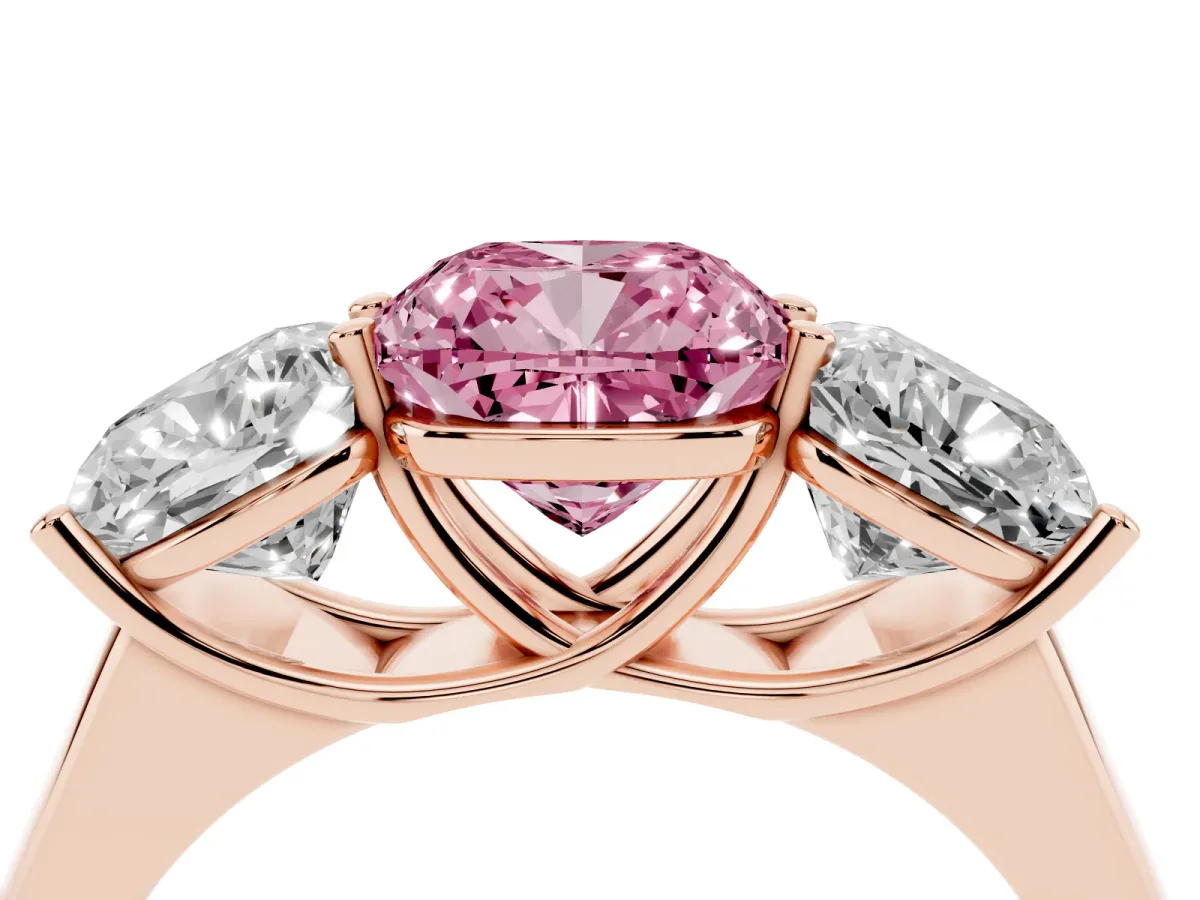 Fancy Pink Cushion Cut Three-Stone Diamond Ring with Prong Setting on a Classic Band Rose gold