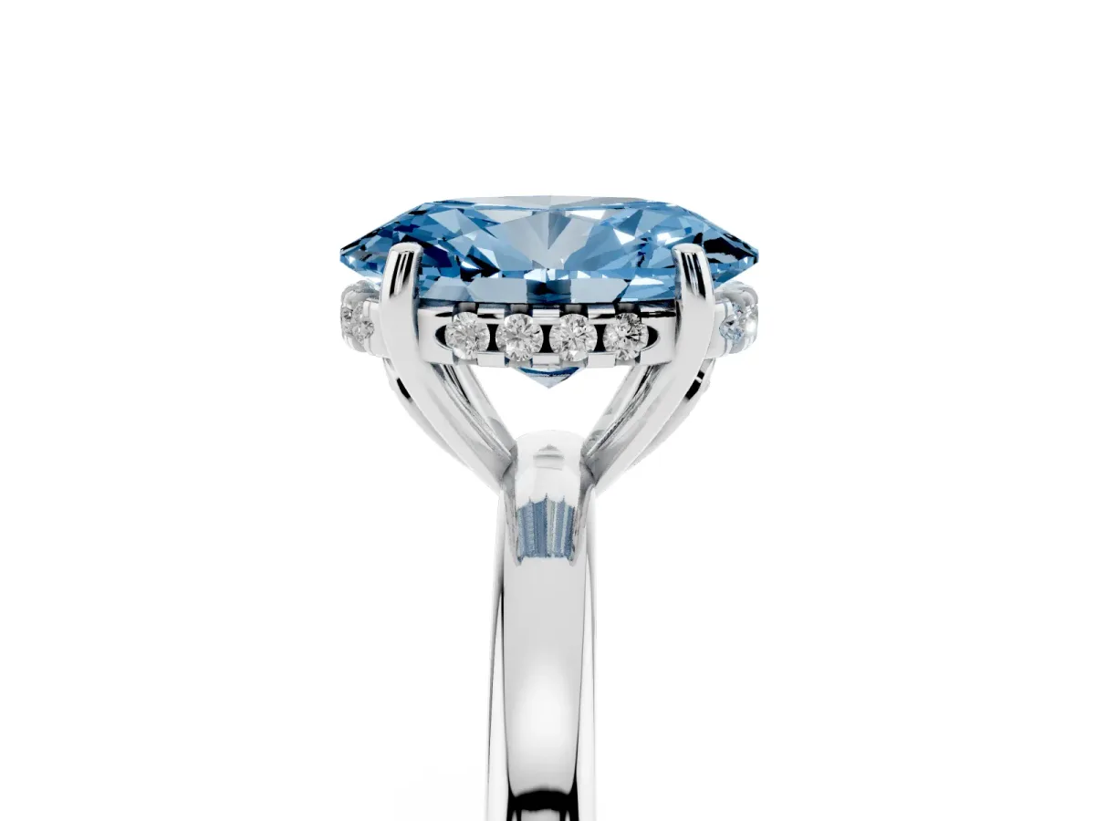 Fancy Blue Oval Cut Solitaire Diamond Ring with Prong Setting and Plain Band Platinum