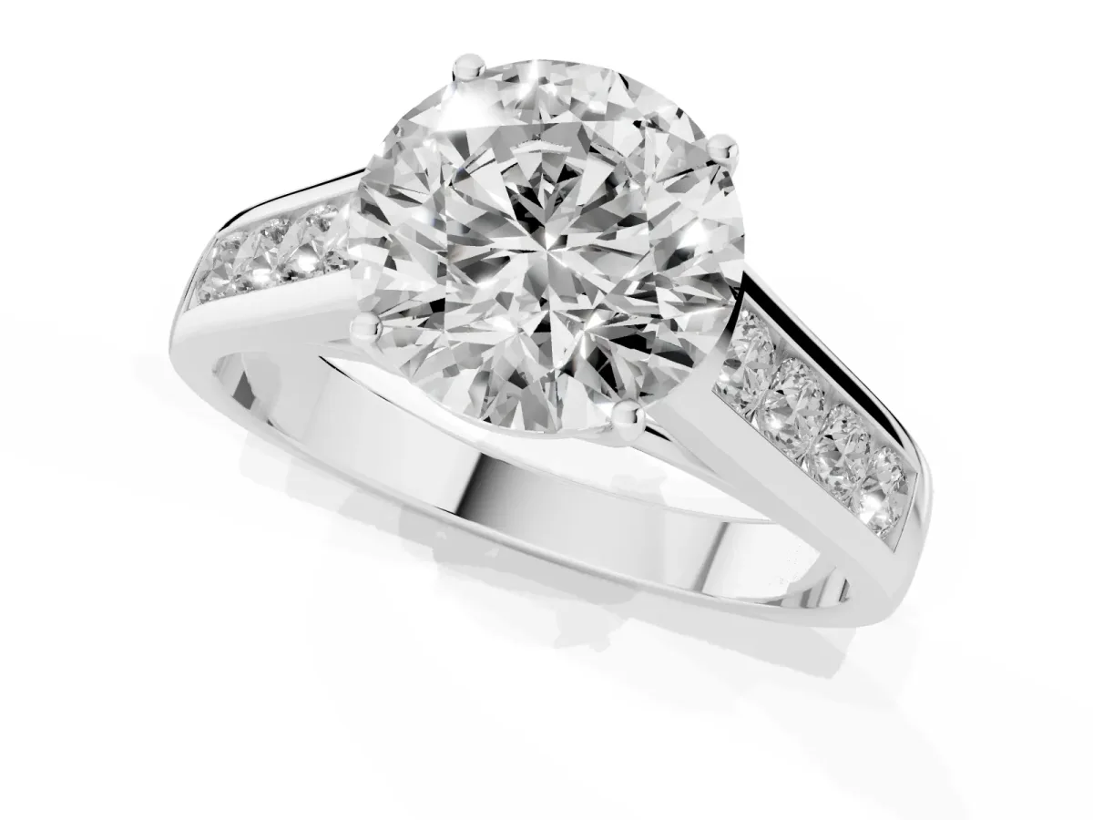 Round Cut Solitaire Channel-Set Diamond Engagement Ring with Four-Prong Setting Silver