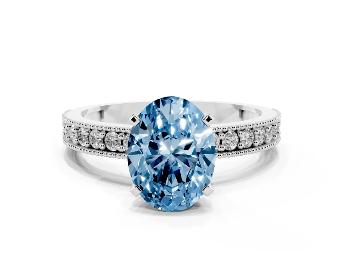 Fancy Blue Oval Cut Diamond Milgrain Pavé Engagement Ring with Four-Prong Setting Platinum