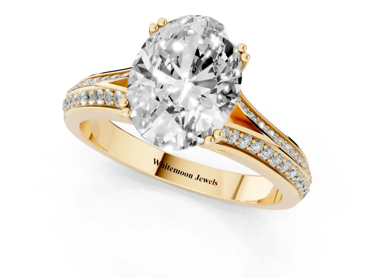 Oval Cut Diamond Split Shank Engagement Ring with Pavé Band Yellow gold
