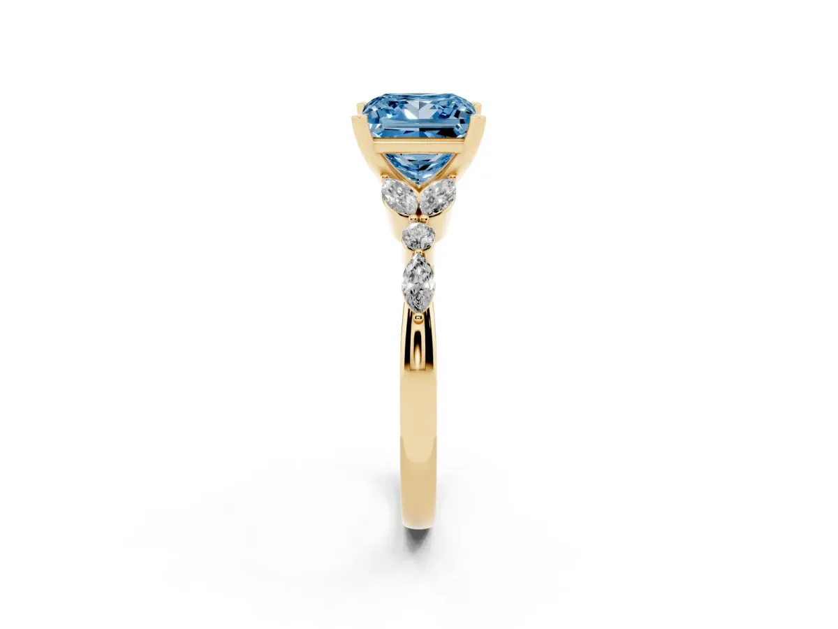 Fancy Blue Princess Cut Diamond Solitaire Ring with Side Stones and Four-Prong Setting Yellow gold