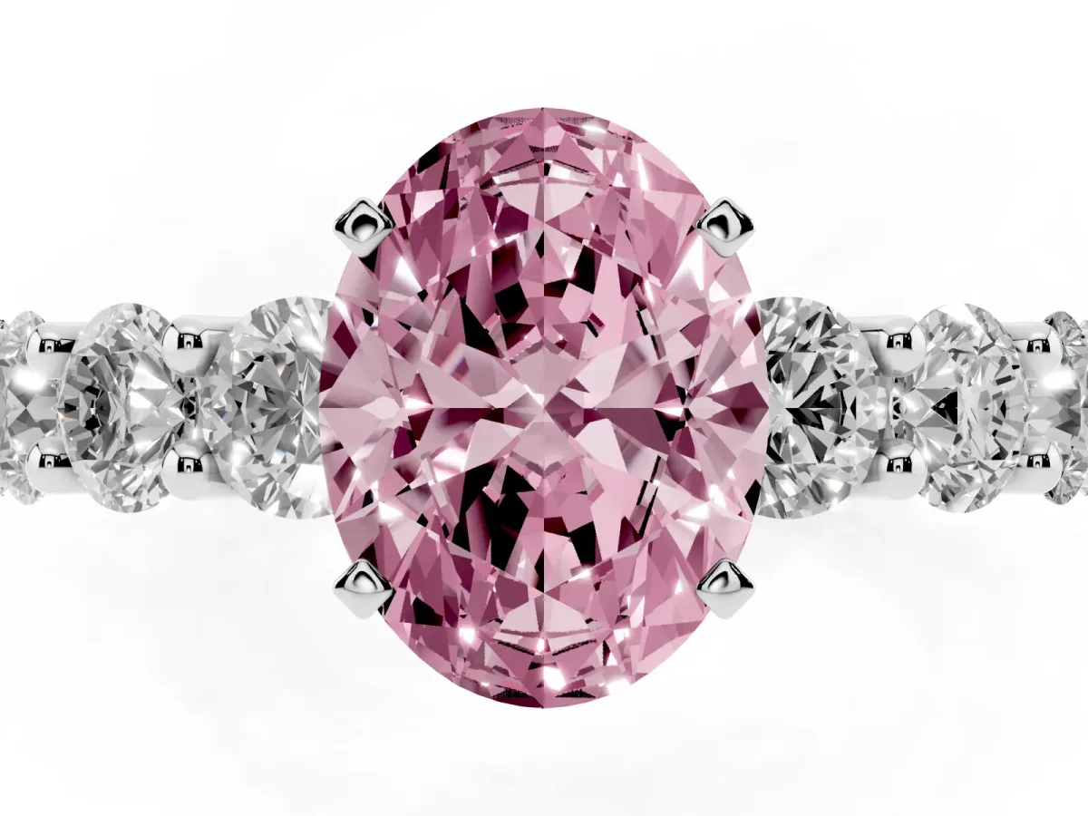 Fancy Pink Oval Cut Diamond Prong Setting with Side Stones on a Pave Band Silver