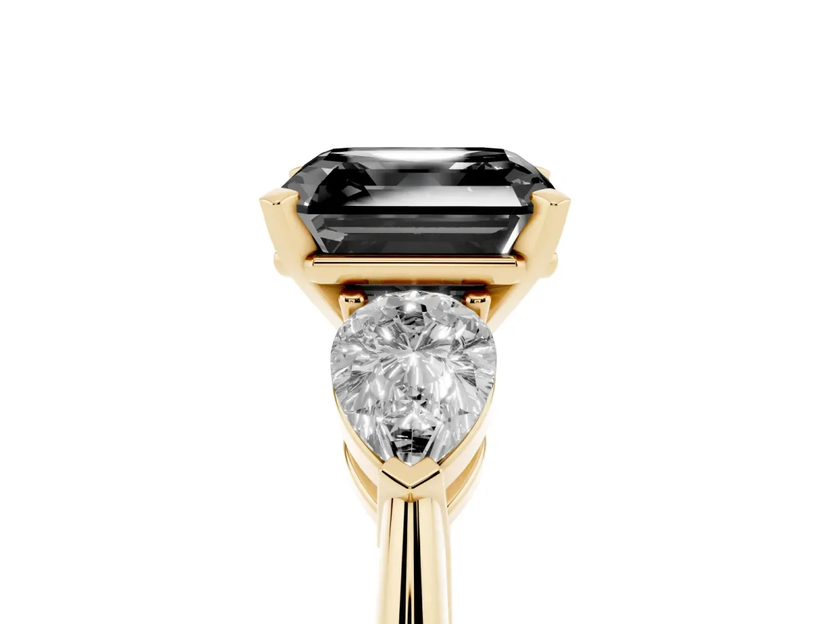 Fancy Black Three-Stone Asscher Cut Diamond Ring with Pear Side Stones and Four-Prong Setting Yellow gold