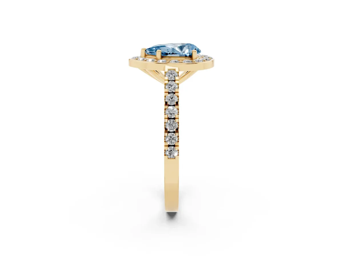Fancy Blue Pear Cut Diamond Halo Ring with Round Pavé Split Shank and Prong Setting Yellow gold