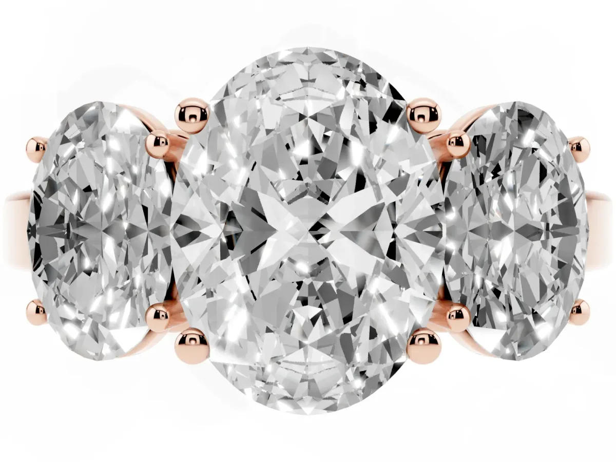 Three-Stone Oval Cut Cut Diamond Engagement Ring with Flat Band and Four-Prong Setting Rose gold