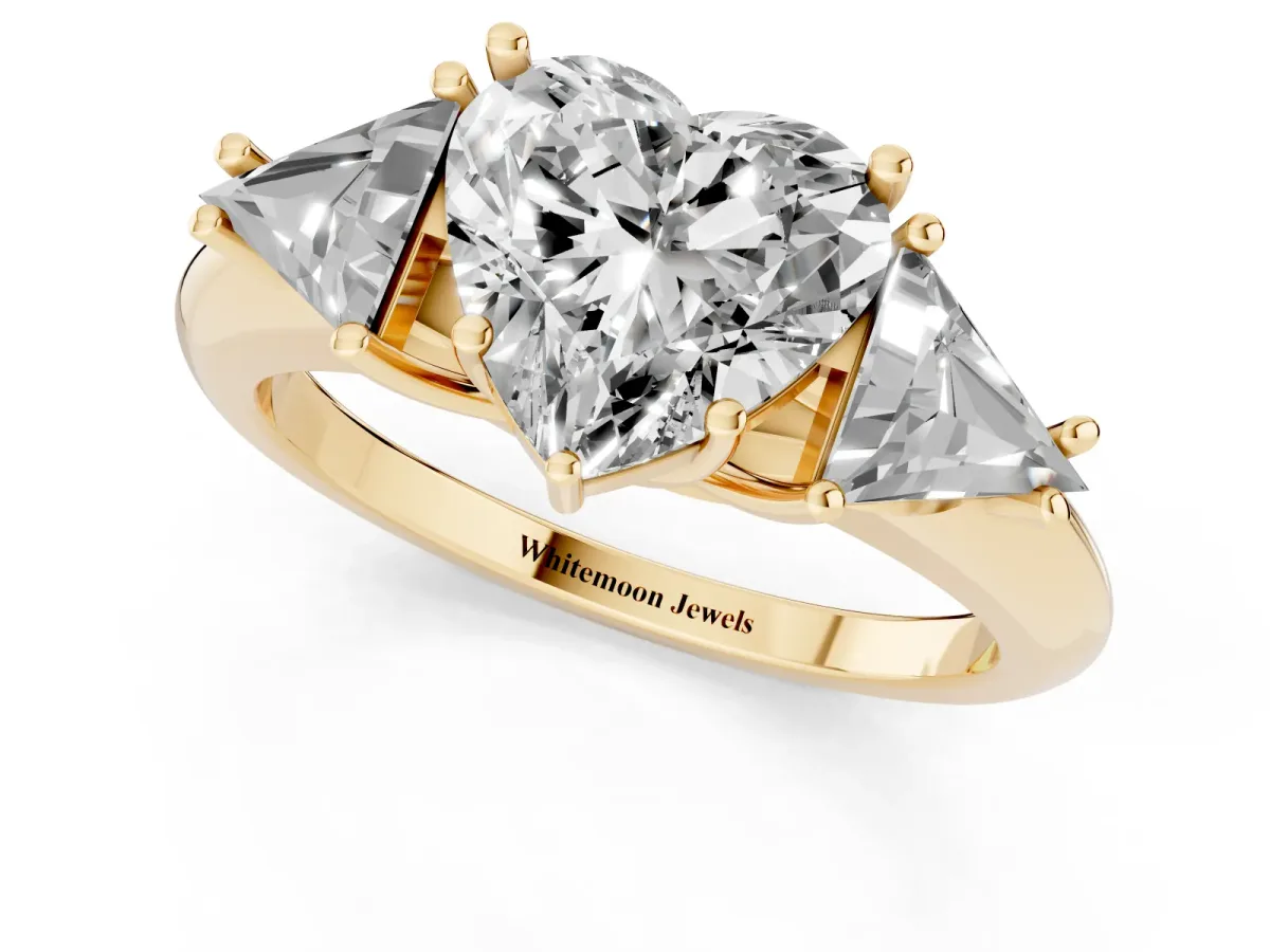 Three-Stone Heart Cut Diamond Engagement Ring with Trillion Side Stones and Prong Setting Yellow gold