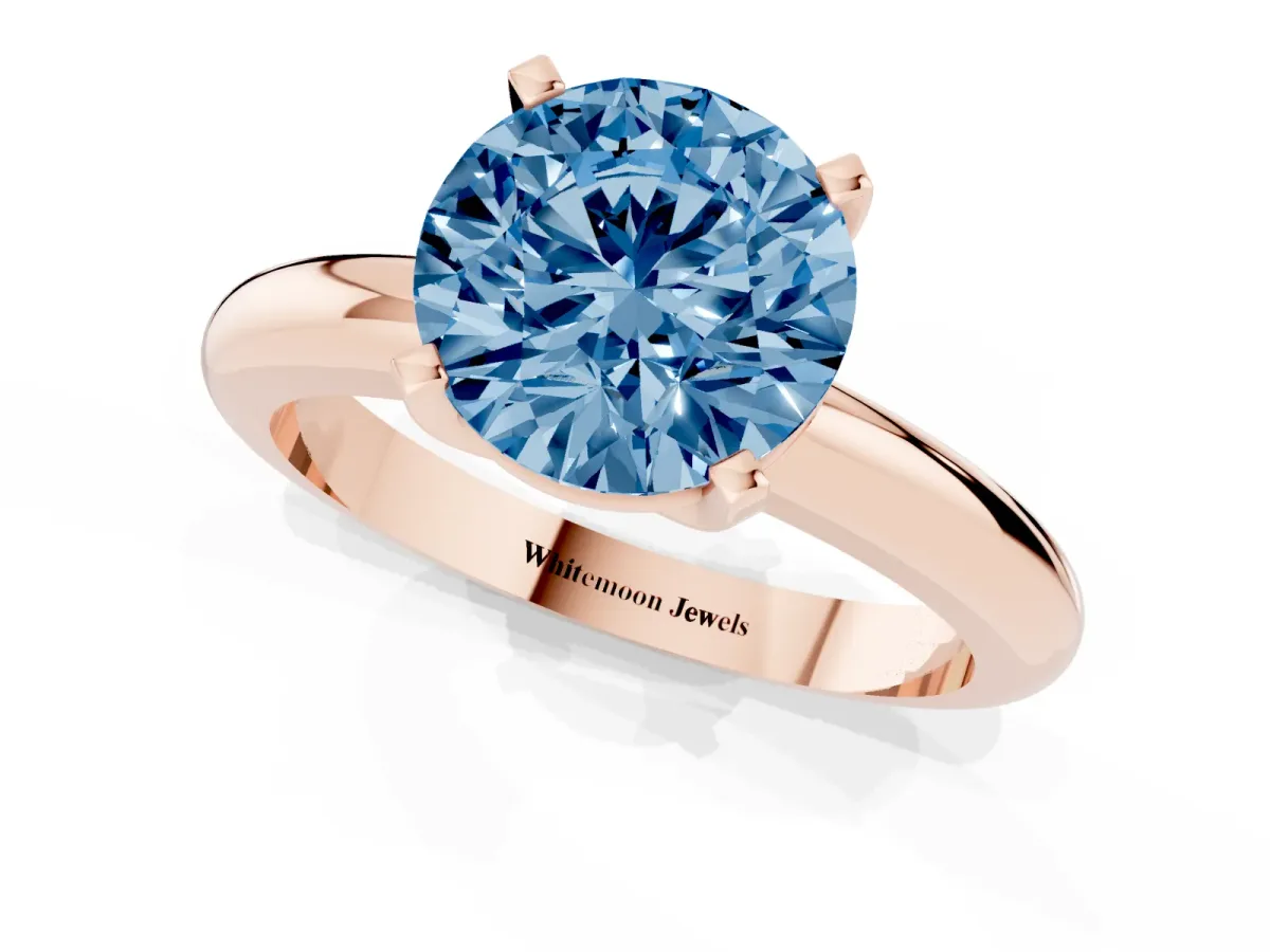 Fancy Blue Round Cut Diamond Solitaire Engagement Ring with Round Band and Four-Prong Setting Rose gold