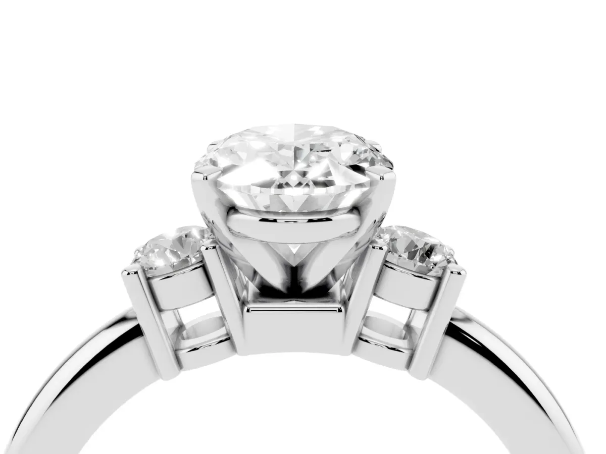 Three-Stone Oval Cut Cut Diamond Solitaire with Prong Setting and Classic Band Silver