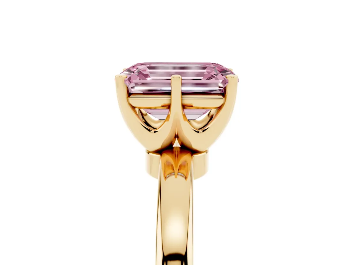 Fancy Pink Emerald Cut Solitaire Diamond Ring with Six-Prong Setting on a Classic Band Yellow gold