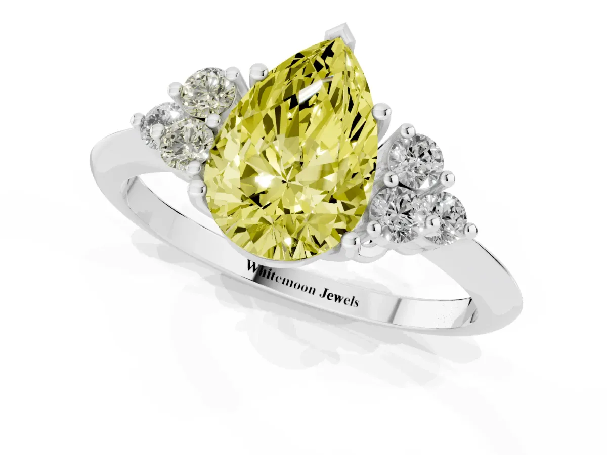 Fancy Yellow Pear Cut Cut Diamond Cluster Ring with Solitaire Band and Four-Prong Setting Silver