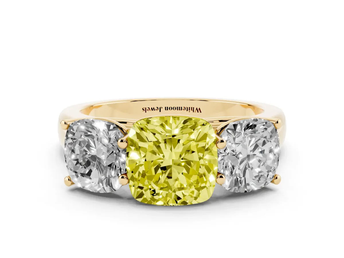 Fancy Yellow Cushion Cut Three-Stone Diamond Ring with Prong Setting on a Classic Band Yellow gold