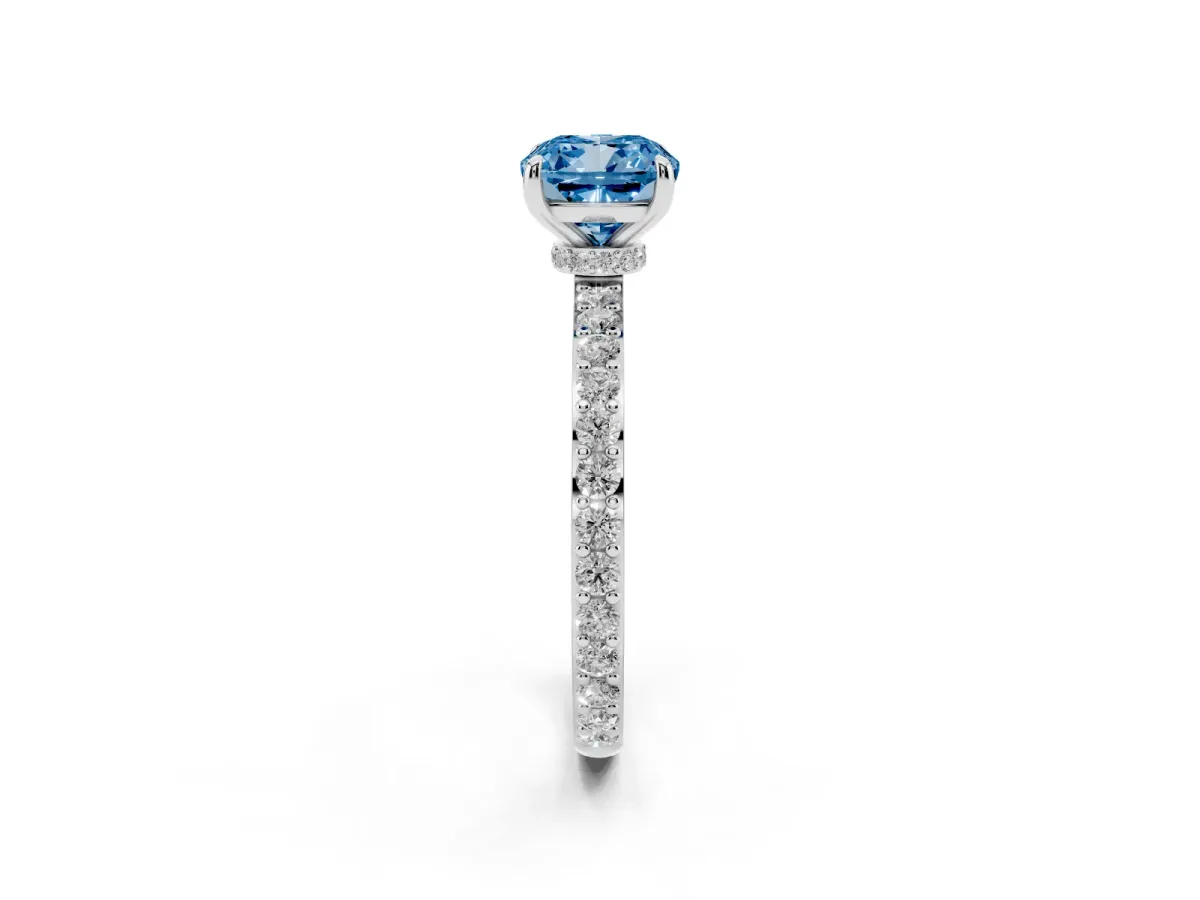 Fancy Blue Cushion Cut Diamond Solitaire Engagement Ring with Pavé Band and Four-Prong Setting Silver