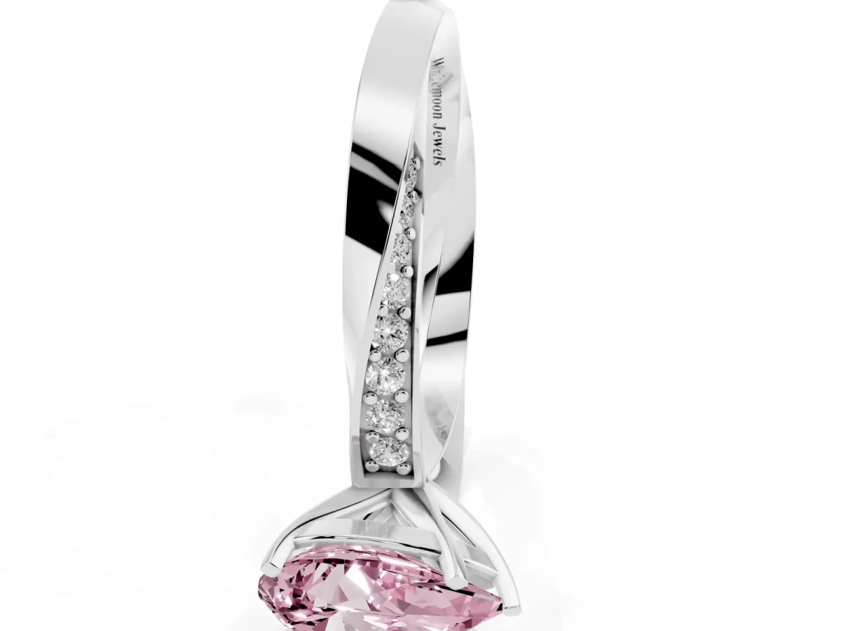 Fancy Pink Pear Cut Diamond Engagement Ring with Side Stone Accents and Four-Prong Setting Silver