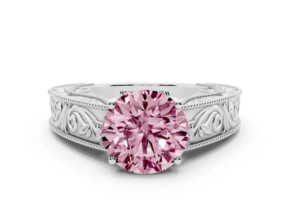 Fancy Pink Round Cut Diamond Solitaire Ring with Engraved Band and Four-Prong Setting White gold