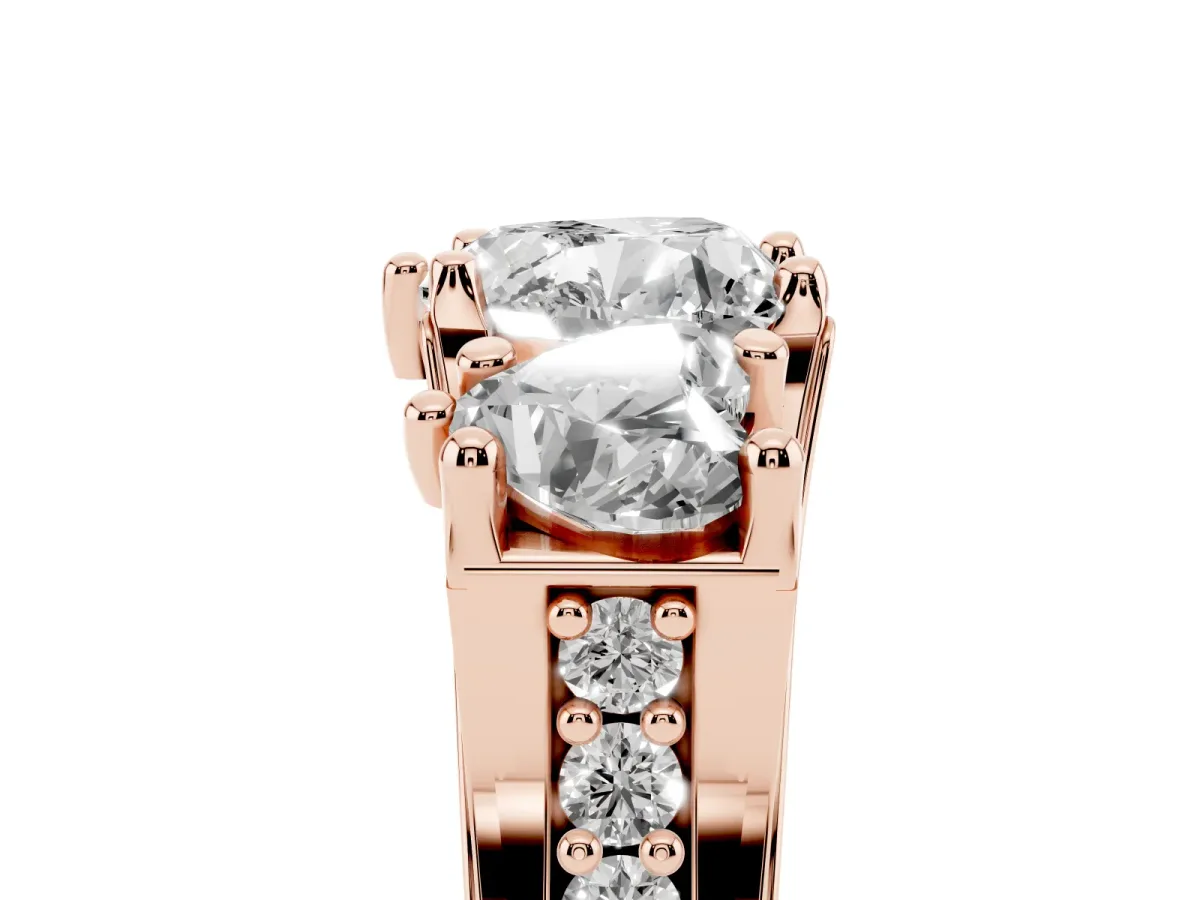 Heart Cut Diamond Three-Stone Ring with Channel Set Band and Four-Prong Setting Rose gold