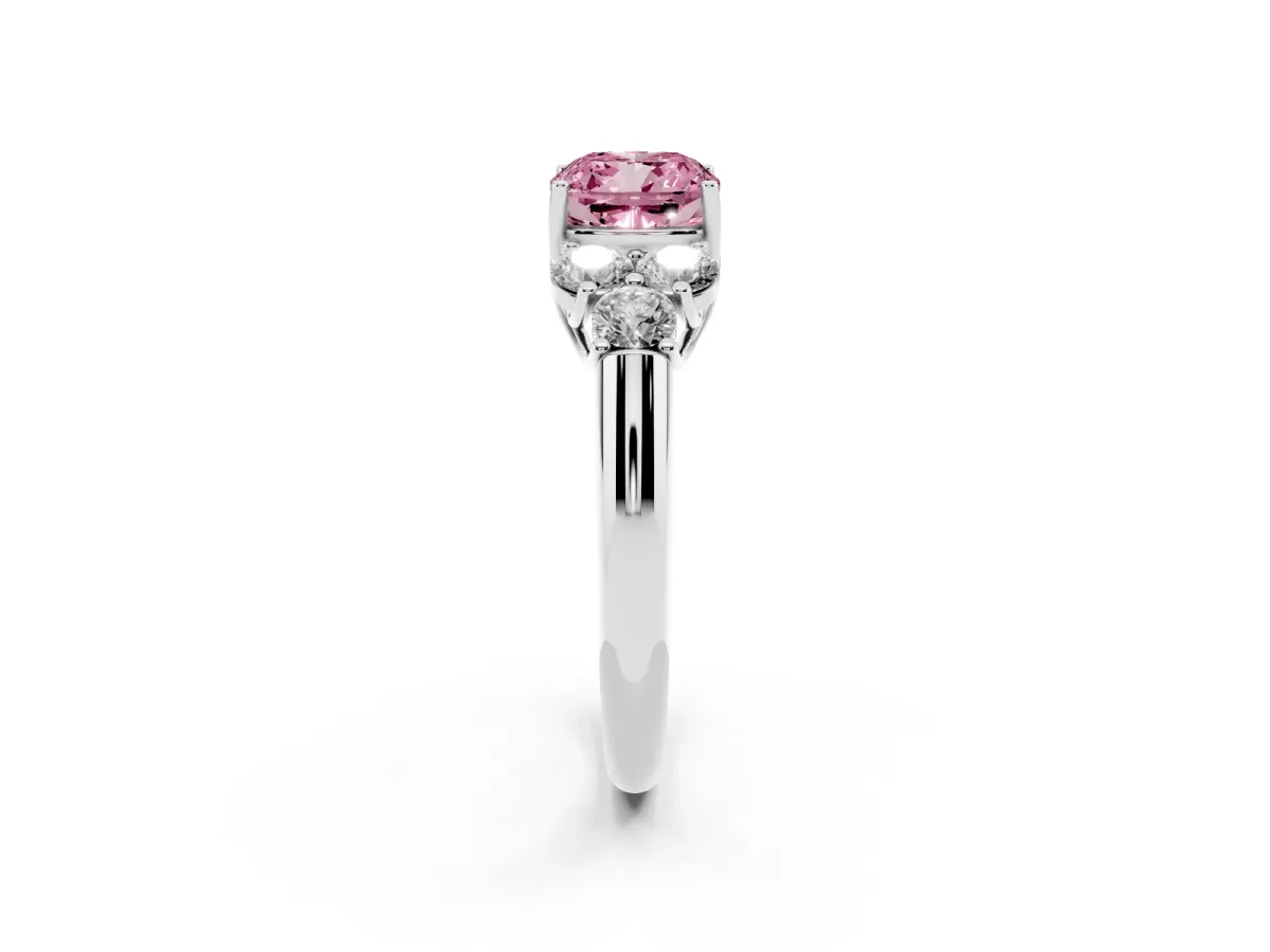 Fancy Pink Cushion Cut Cut Diamond Cluster Ring with Round Accent Stones and Prong Setting on a Classic Band Platinum