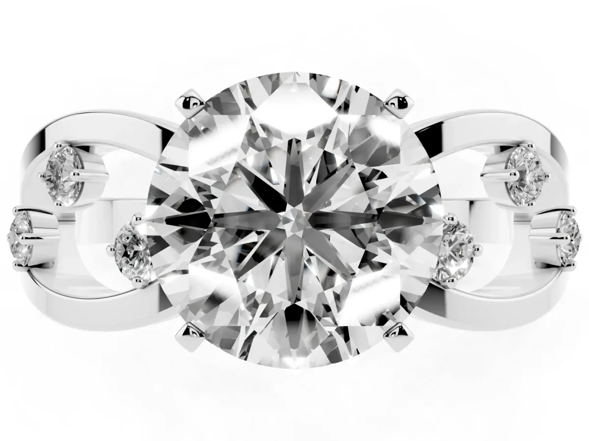 Round Cut Cut Solitaire Diamond with Side Stones on Criss-Cross Band and Four-Prong Setting Silver