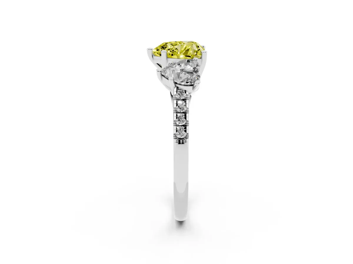 Fancy Yellow Three-Stone Heart Cut Diamond Ring with Round Pavé Band and Prong Setting Silver