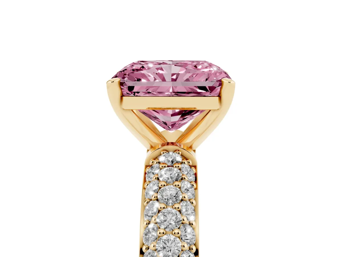 Fancy Pink Radiant Cut Diamond Solitaire Ring with Prong Setting and Pavé Band Yellow gold
