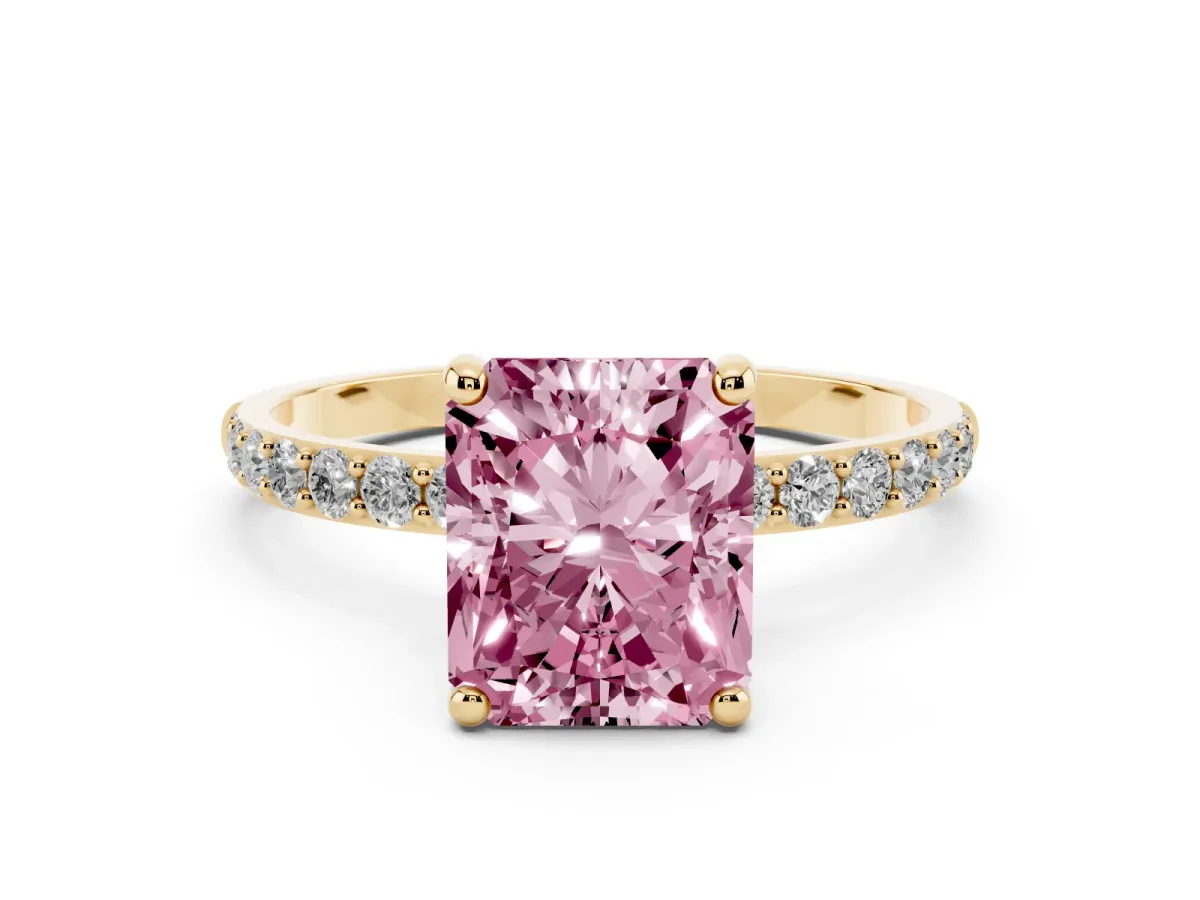 Fancy Pink Radiant Cut Diamond Solitaire Ring with Round Pavé Band and Prong Setting Yellow gold