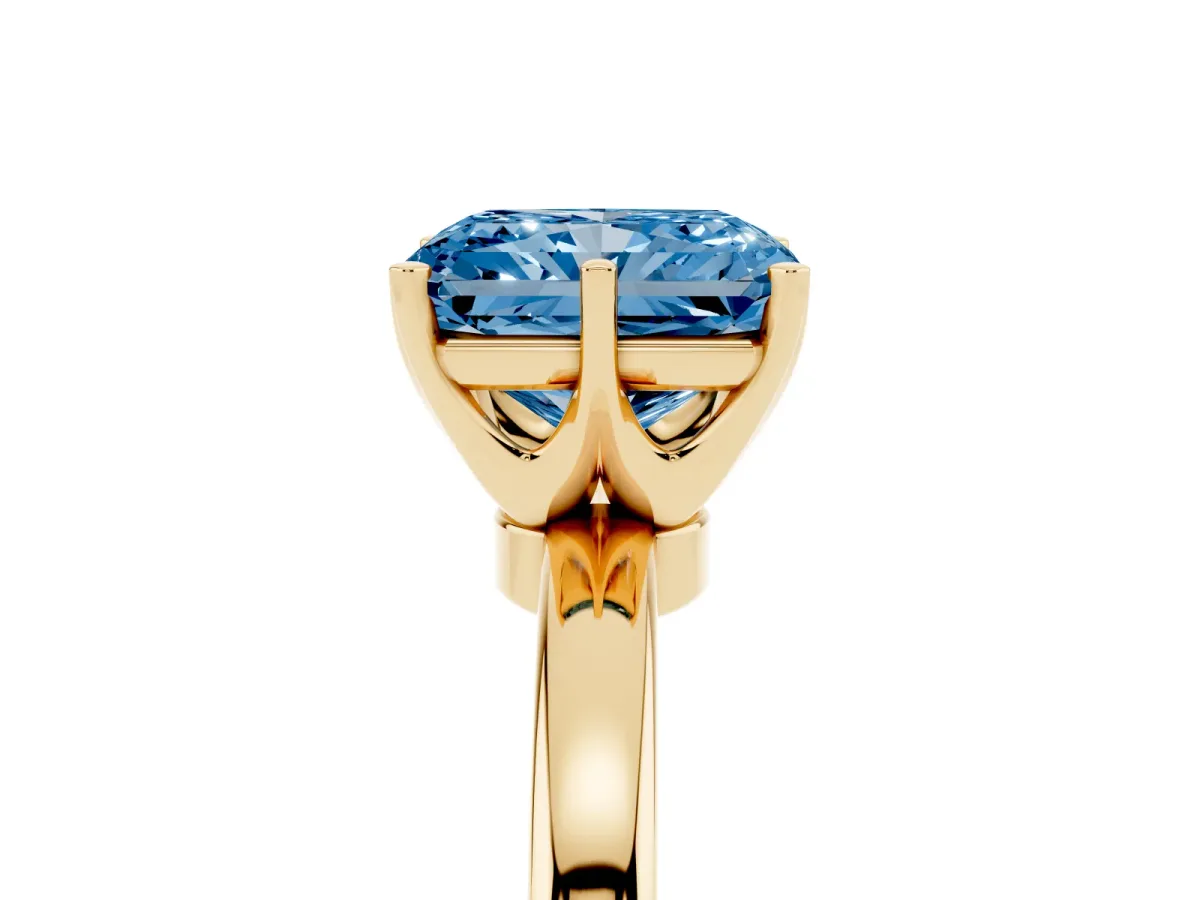 Fancy Blue Radiant Cut Solitaire Diamond Ring with Six-Prong Setting on a Classic Band Yellow gold