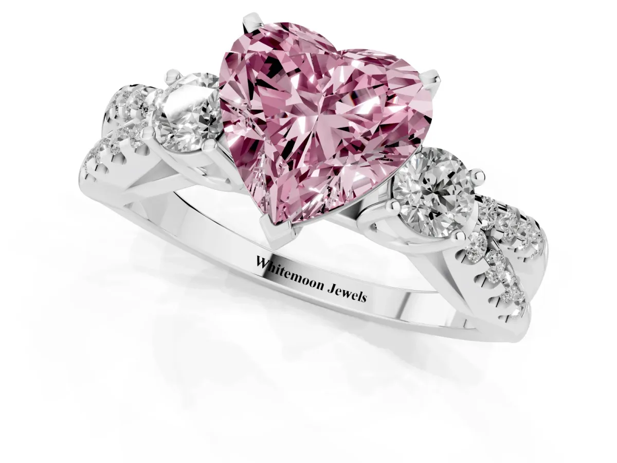 Fancy Pink Heart Cut Diamond Three-Stone Ring with Pavé Split Shank and Four-Prong Setting Platinum