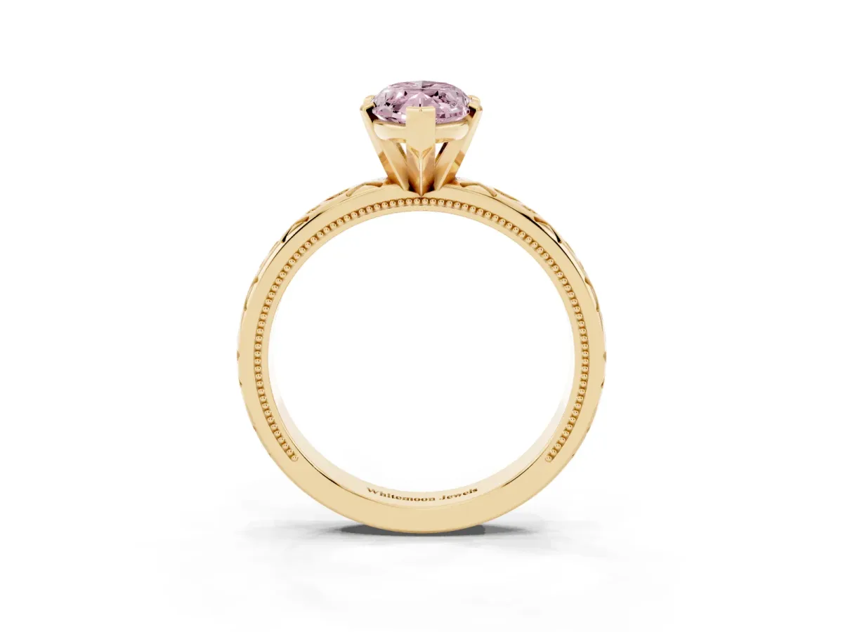 Fancy Pink Marquise Cut Solitaire Engagement Ring with Scrollwork Band and Four-Prong Setting Yellow gold