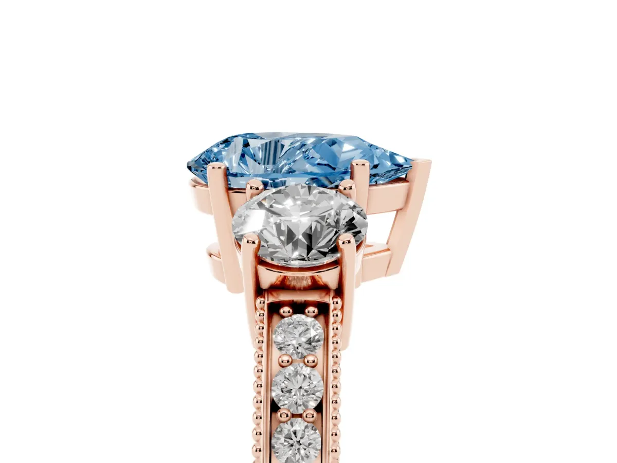 Fancy Blue Pear Cut Three-Stone Diamond Ring with Pavé Band and Four-Prong Setting Rose gold