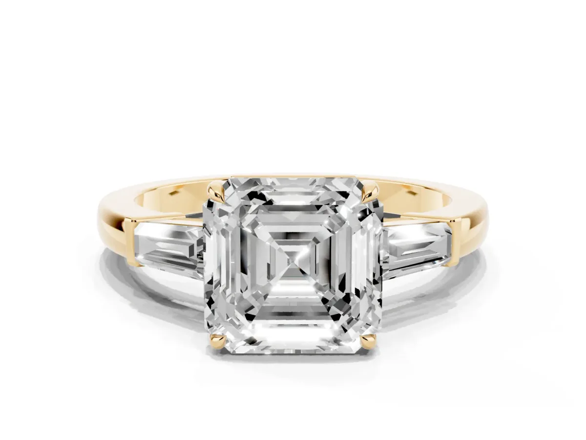 Asscher Cut Diamond Three-Stone Ring with Tapered Baguette Side Stones and Prong Setting Yellow gold