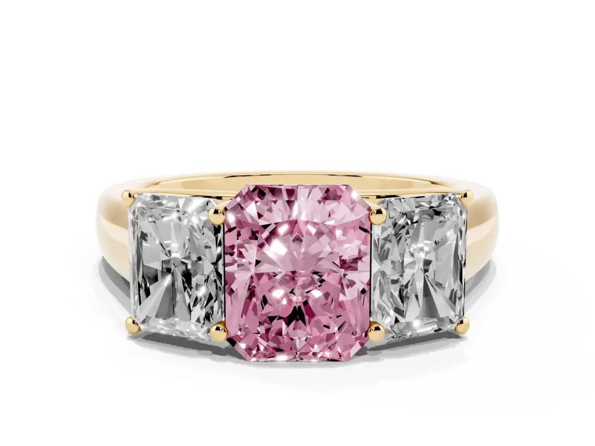 Fancy Pink Radiant Cut Three-Stone Diamond Ring with Prong Setting on a Classic Band Yellow gold