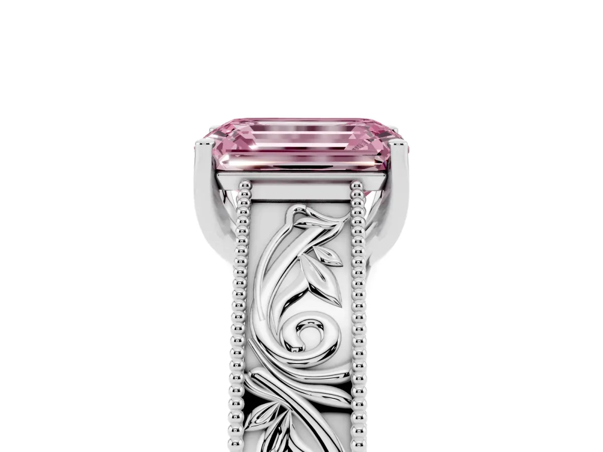 Fancy Pink Emerald Cut Diamond Solitaire Ring with Engraved Band and Four-Prong Setting Platinum