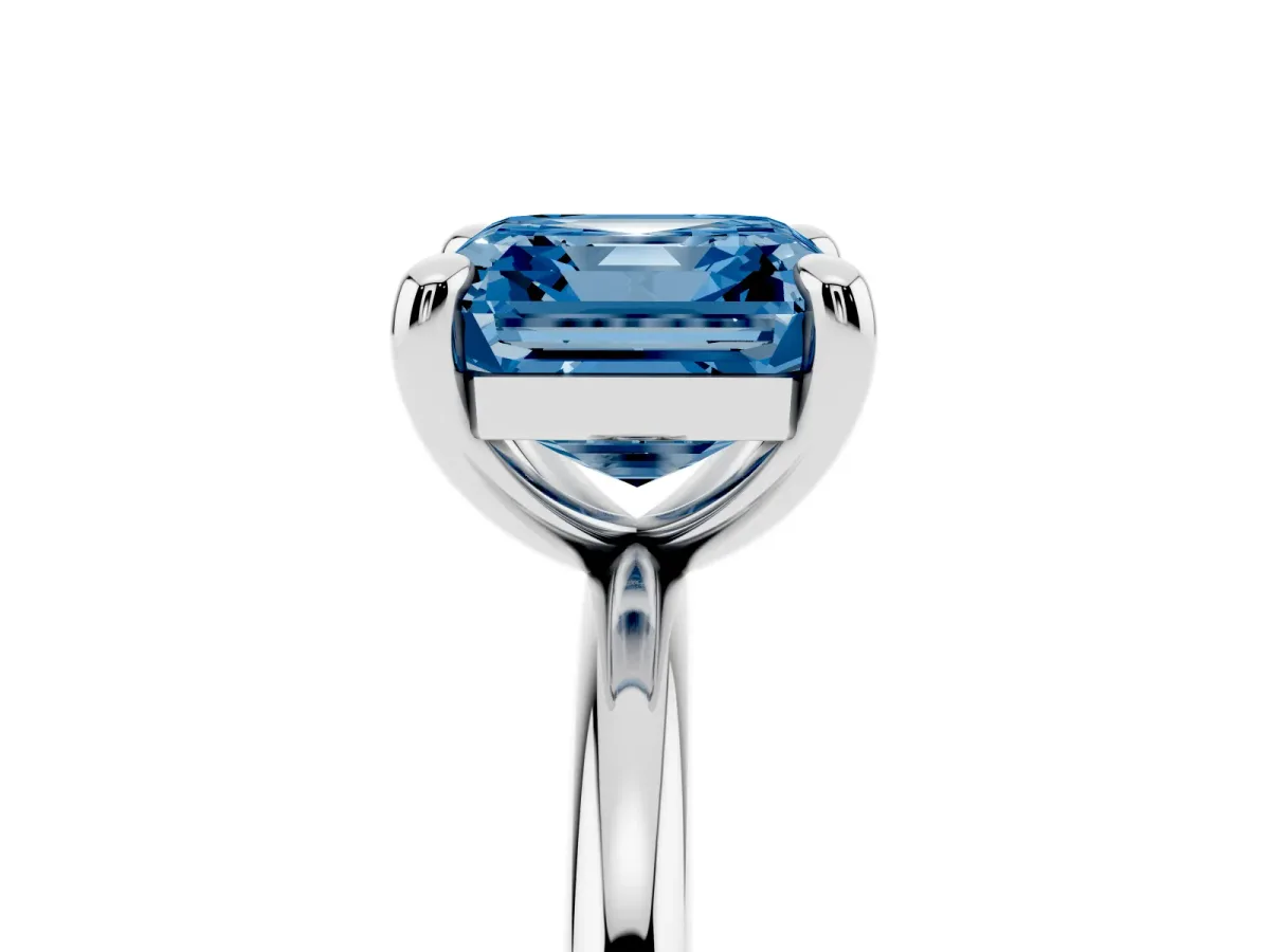 Fancy Blue Asscher Cut Solitaire Diamond Ring with Four-Prong Setting on a Plain Band Platinum