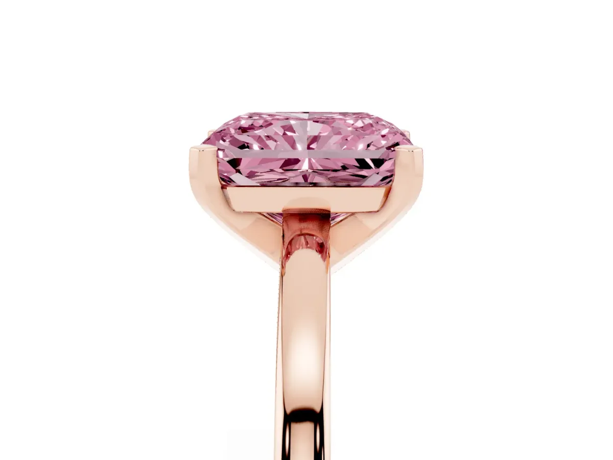 Fancy Pink Radiant Cut Solitaire Diamond Engagement Ring with Four-Prong Setting on a Classic Band Rose gold