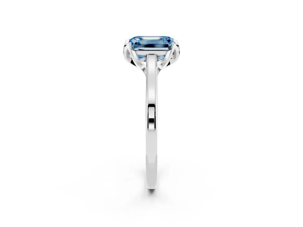 Fancy Blue Emerald Cut Diamond Solitaire Ring with Flower Prong Setting and Classic Band Silver