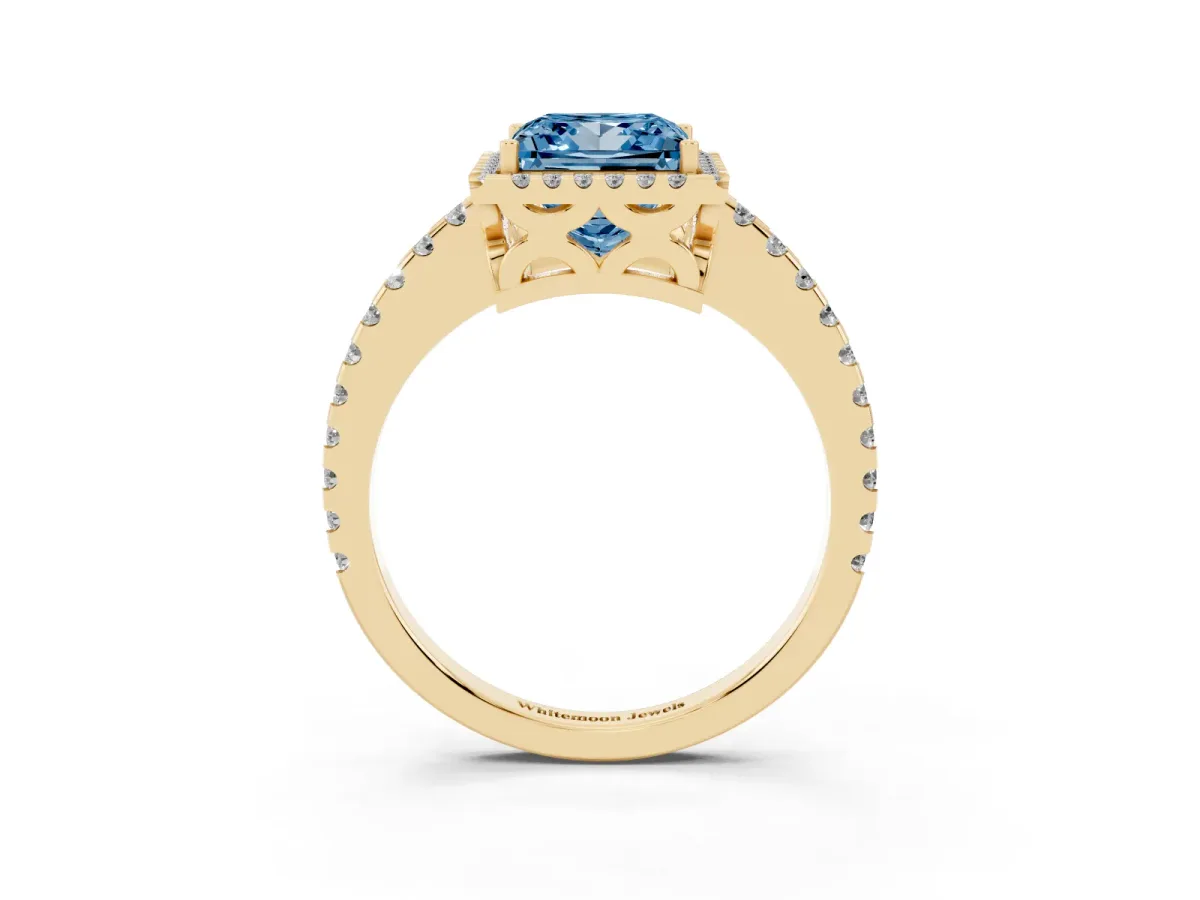 Fancy Blue Princess Cut Diamond Halo Engagement Ring with Pavé Band and Prong Setting Yellow gold